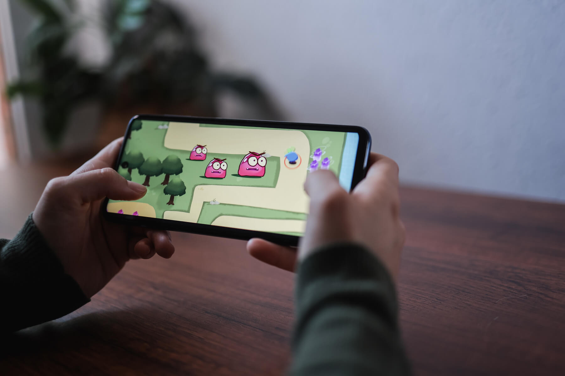 Gamer Playing Online Video Games On Mobile Phone A 2023 11 27 05 04 16 Utc